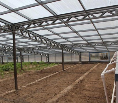 Solar panel greenhouse